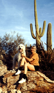 This is a photograph of Judi Moreillon and her standard poodle Tessa.